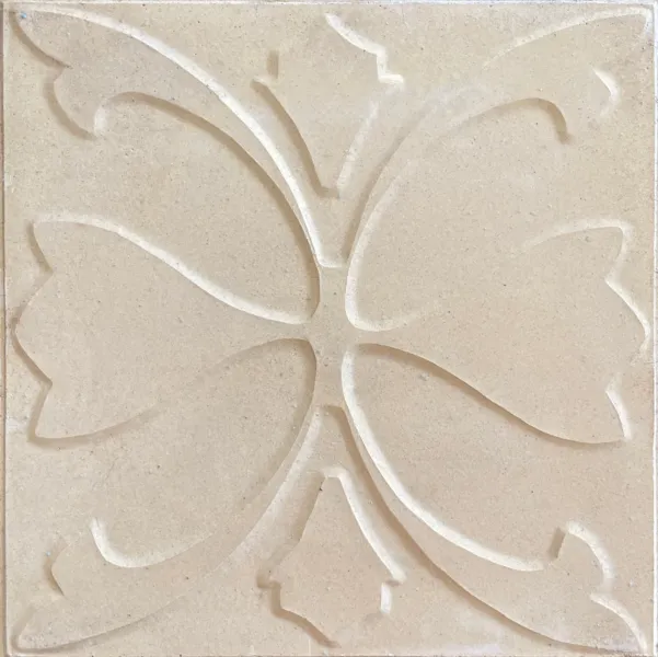 Baldosa calcárea 25x25 flor con relieve